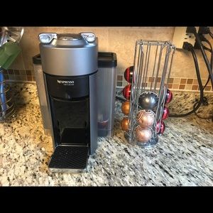 Nespresso machine with pod holder